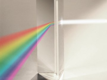 Allow children to play with prisms to understand light refraction or try a simple experiment.