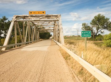 Beam bridges are often used for short distances.
