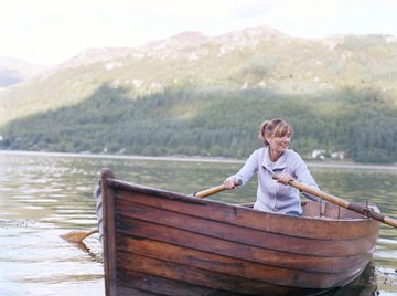 Boats, including rubber ones, float because they weigh less than the water they displace.