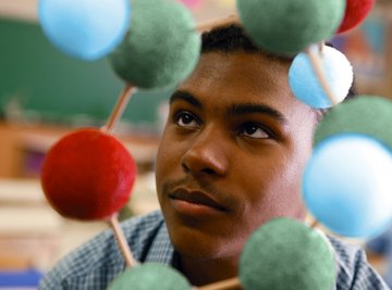 Color Styrofoam balls represent different parts of the atom.