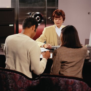 Couple Filling out an Application for a Home Loan