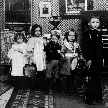 Small children can worship God with instruments and praise.