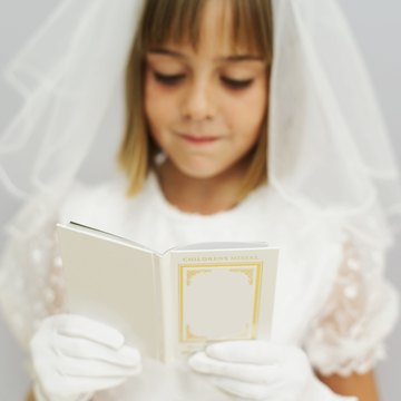 You can make the veil and add fresh flowers the day of the ceremony.