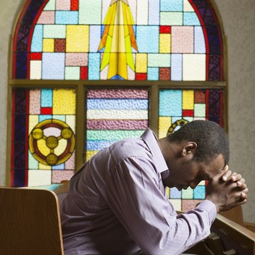 Man praying in church