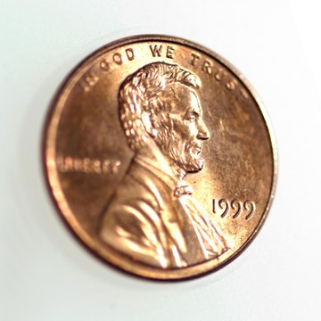 A penny leaves a simple, but meaninful, message on a grave.