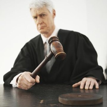 A judge makes the final determination regarding the disposition of a warrant.