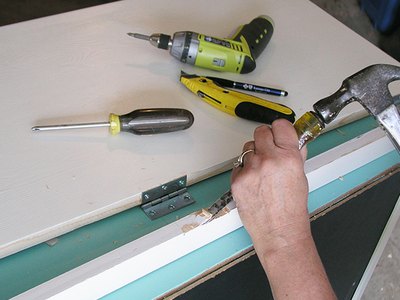 Carefully chisel out slots for the hinges.