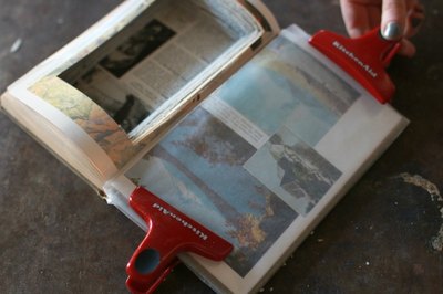 Kitchen or binder clips help keep the wax paper in place.