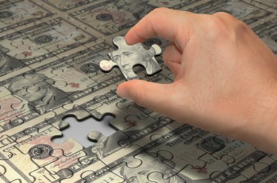 puzzle dollar image by ktsdesign from Fotolia.com Deciding where to invest your money requires an understanding of the difference between the stock and bond markets.