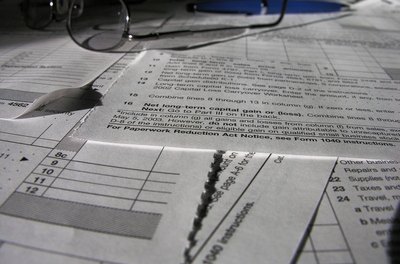 tax time image by Tom Oliveira from Fotolia.com If you've tied the knot in the past year, tax season might be different.