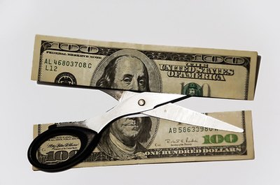 100 dollar cut with scissors image by Yanir Taflev from Fotolia.com Addtional principal payments cut down the length of your mortgage and the total interest paid.