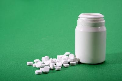 Medication image by bluefern from Fotolia.com Dogs can take some—but not all—human medications.