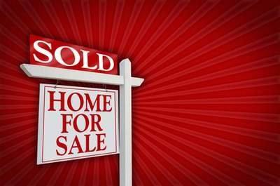 Sold Home For Sale Sign on Burst image by Andy Dean from Fotolia.com Buying makes sense only if you plan to stay put.