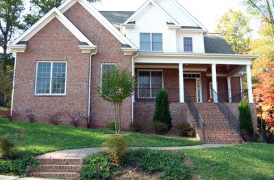 Brick family house image by tarheel1776 from Fotolia.com Wrap-around mortgages increase property investors' options.