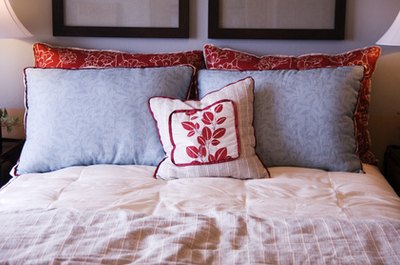 beautiful bedroom image by Paul Hill from Fotolia.com Home is where the heart is, but it is also a major financial investment.