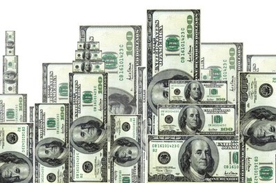 money city image by Richard Kane from Fotolia.com Monitor your family's money usage practices.