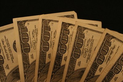 money image by cherie from Fotolia.com The more money you invest in a CD, the higher your return will be.