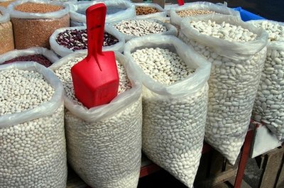 bazaar trade of various bean image by Maria Brzostowska from Fotolia.com Commodities trading is an investment opprotunity with high profit potential.