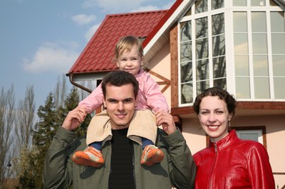 family with baby and house image by Pavel Losevsky from Fotolia.com Fixed-rate mortgages and ARMs each have advantages and disadvantages.