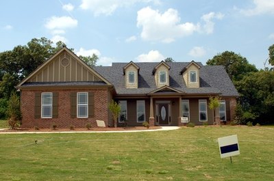 new home for sale image by itsallgood from Fotolia.com Loan modifications are supposed to help homeowners avoid foreclosure.