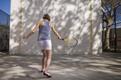 Jupiterimages/Comstock/Getty Images Drilling on a backboard helps to groove your strokes.