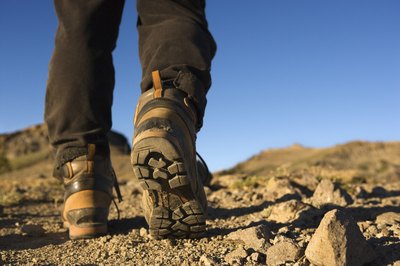 Jupiterimages/Comstock/Getty Images Proper conditioning can protect your knees from injury.