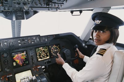 Digital Vision./Photodisc/Getty Images Top-paid pilots can earn over $140,000 annually.
