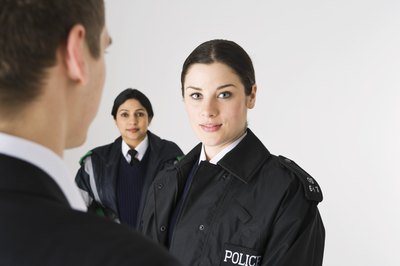 Jupiterimages/Polka Dot/Getty Images The prerequisites to be a police cadet vary depending on the area.