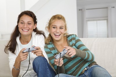 Jupiterimages/Goodshoot/Getty Images Software testers play video games for a living.