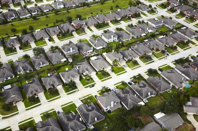 Thomas Northcut/Photodisc/Getty Images It's a good idea to figure the cost of a mortgage before signing an offer to purchase.