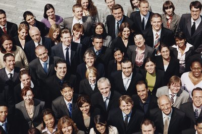 Digital Vision./Digital Vision/Getty Images Group insurance spreads risk across a large number of people.