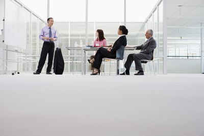 Jupiterimages/Creatas/Getty Images Choose a moderator who can keep the mood light while staying on task.