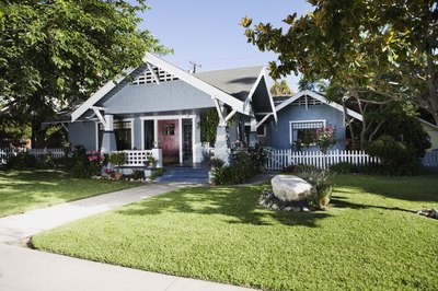Jupiterimages/Stockbyte/Getty Images The value of your home may factor into your deductible decision.