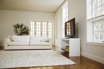 Jupiterimages/Creatas/Getty Images A room addition can add space and value to a home.