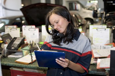 Creatas/Creatas/Getty Images Shipping agents record data such as cargo weight and dimensions on items shipped.