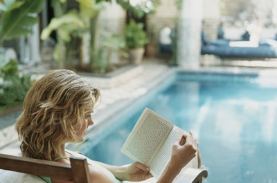 Digital Vision./Digital Vision/Getty Images Being an avid reader is one requirement for becoming a book editor.
