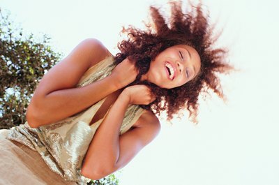 Digital Vision./Digital Vision/Getty Images Sertonin is an important hormone for happiness.