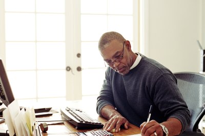 Siri Stafford/Digital Vision/Getty Images An assisted living staff scheduler manages last-minute absenteeism.