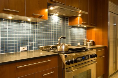 Jupiterimages/Photos.com/Getty Images A tile backsplash can help you add style to your space on a budget.