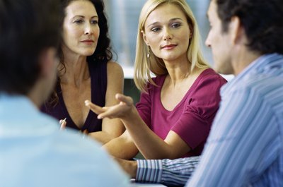 Stockbyte/Stockbyte/Getty Images Work with slow learners to help boost their productivity.