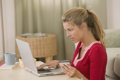 Jupiterimages/Comstock/Getty Images With a budget, you know how much you have to contribute to credit card debt.