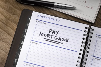 Jeffrey Coolidge/Photodisc/Getty Images Paying bills on time is vital to having a good credit score.