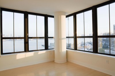 Jupiterimages/Creatas/Getty Images A good credit score may earn you a reduced monthly rent.