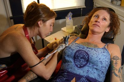 Thinkstock/Comstock/Getty Images Professional piercers, who sometimes do tattoos, earn more in Washington, D.C.
