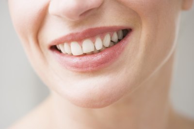 Polka Dot Images/Polka Dot/Getty Images Good oral health can protect you from decay.