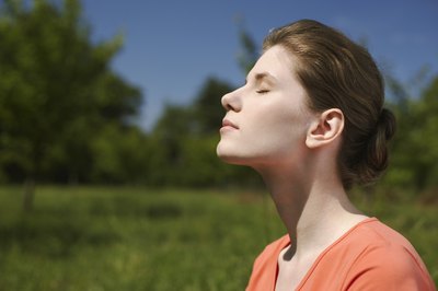 Jupiterimages/Creatas/Getty Images Guided imagery exercises can be combined with deep breathing to promote relaxation.