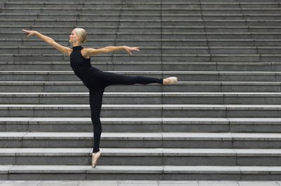 Polka Dot Images/Polka Dot/Getty Images Improve your arabesque with a yoga stretch.