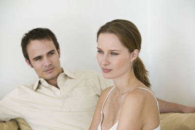 Jupiterimages/Goodshoot/Getty Images Don't let money get in the way of your marriage.