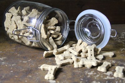 ErimacGroup/iStock/Getty Images The top of the barrel creates a great stand for Fido's treats.