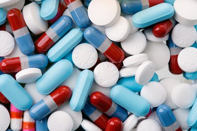 Jupiterimages/Photos.com/Getty Images The prescriptions a person takes cannot impact their employment.